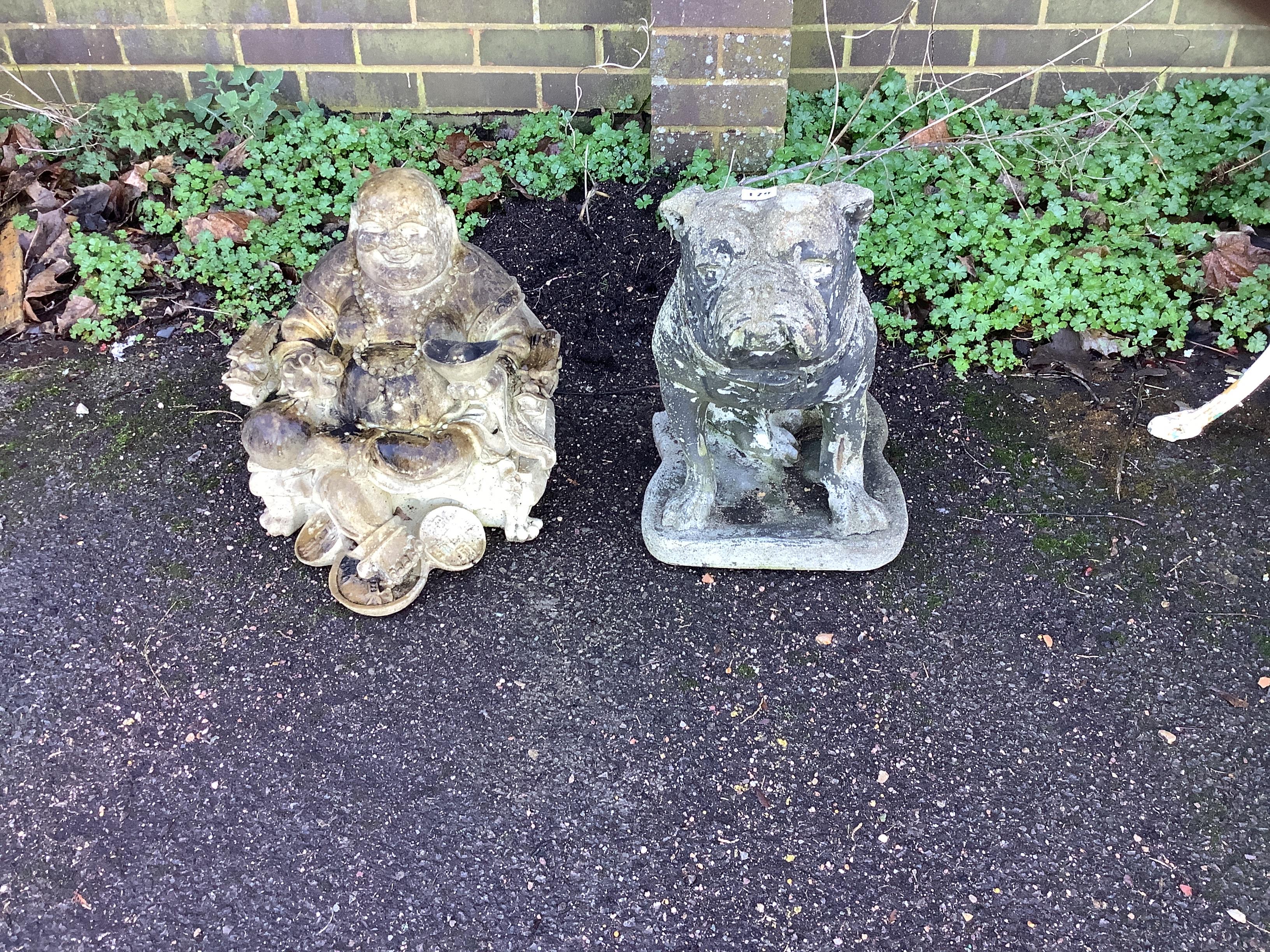A reconstituted stone bulldog garden ornament, height 45cm together with a resin Buddha